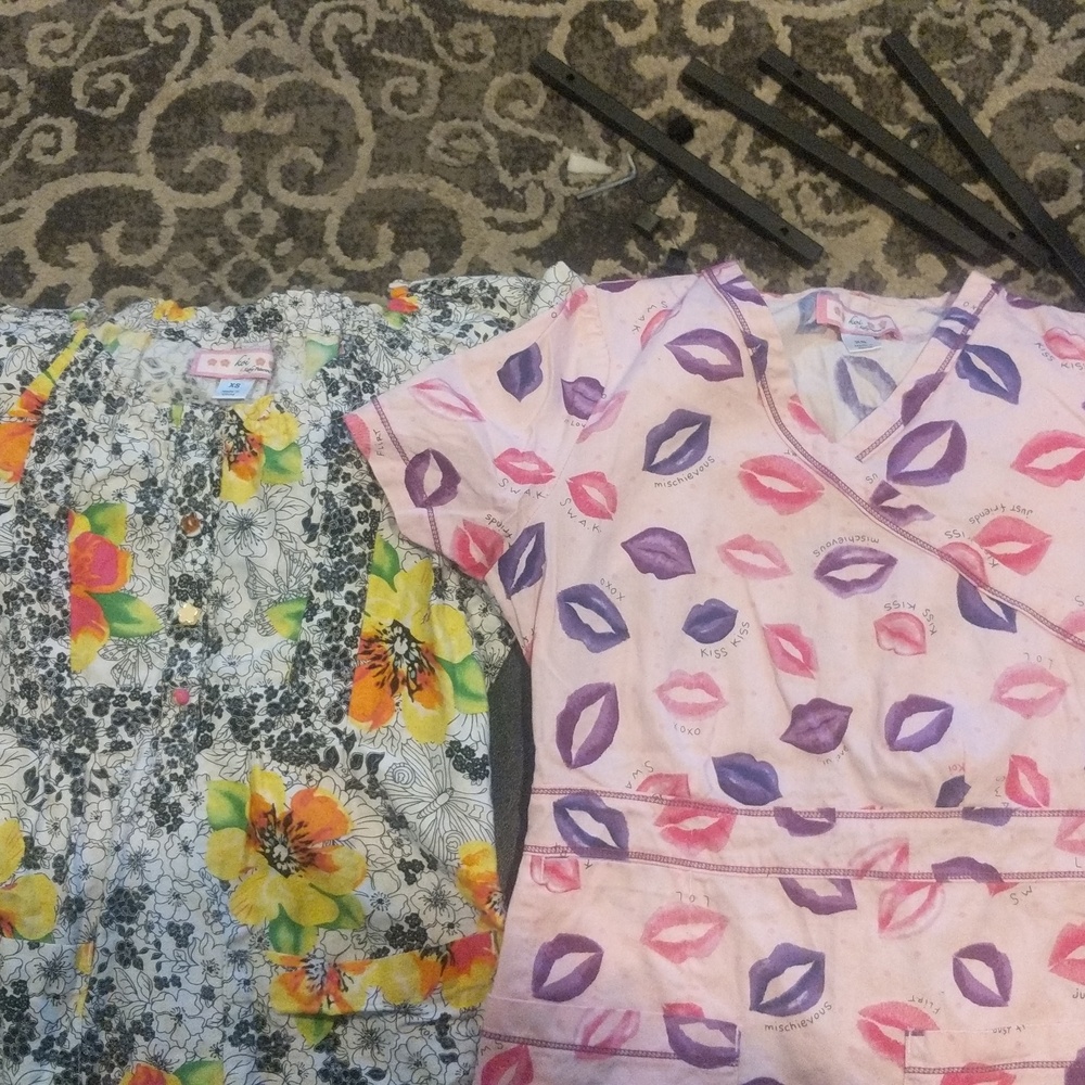 Lot of 2 Koi scrub tops size xs.